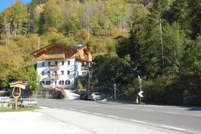 a house on the side of a road at LA CIESA DEI SIORI in Alleghe
