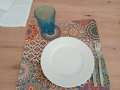 a plate and a glass on a table at Apartment Himmelreich 29 in Plaus