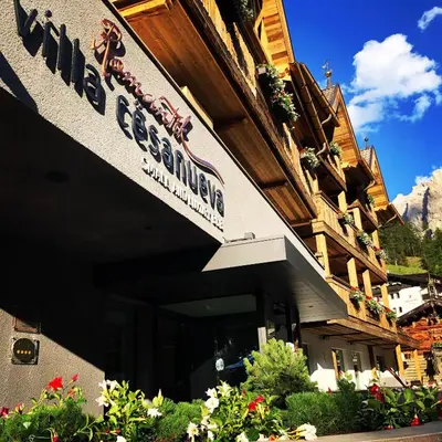 a building with a sign that reads hotel gstaad at Romantik Villa Cesanueva in Selva di Val Gardena