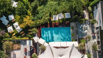 an overhead view of a swimming pool and a resort at Parkhotel Marlena - Adults Only in Merano