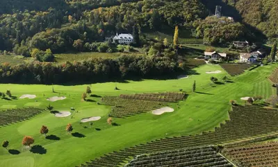 an aerial view of a golf course with a green at Parkhotel Marlena - Adults Only in Merano