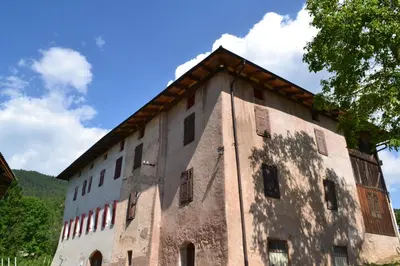 an old building with windows on the side of it at Agritur Maso Forcola in Brez