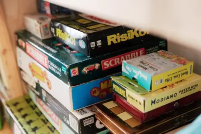 a stack of books stacked on top of each other at Dolomitihouse CASTAGNER in Fiera di Primiero