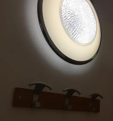 a light on the ceiling of a bathroom at sonnige schicke Ferienwohnung Meran Pienzenau in Merano