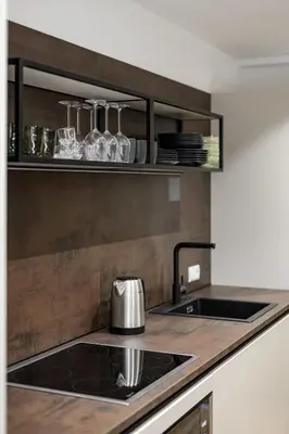 a kitchen with a sink and a counter top at Sambock Quarter Pustrabase in Brunico