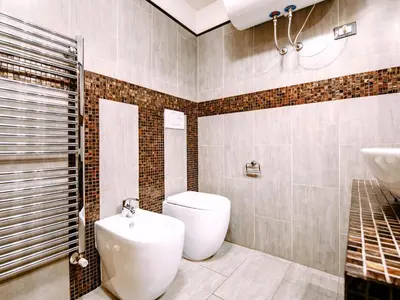 a bathroom with a toilet and a sink and a shower at Apartment Cesa Veja by Interhome in Penia
