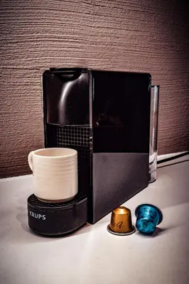 a coffee maker sitting on top of a table at Villa Kranebitt in Bressanone