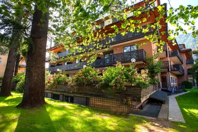 a building with plants on the side of it at Hotel Chrys in Bolzano