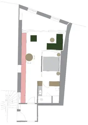a plan of a building with green at Goldengel Design-Suiten Frieda Maria im Herzen von Kaltern in Caldaro