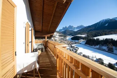 a balcony with a view of the mountains at Galreidhof in Funes