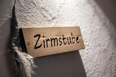 a sign on a wall with the word jengesis at Mesnerhof in Valles