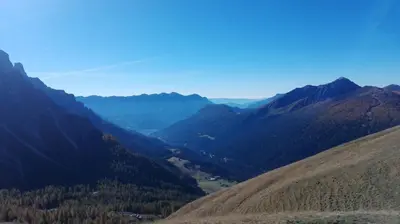 a view of a valley in the mountains at Casette Margherita in Fiera di Primiero