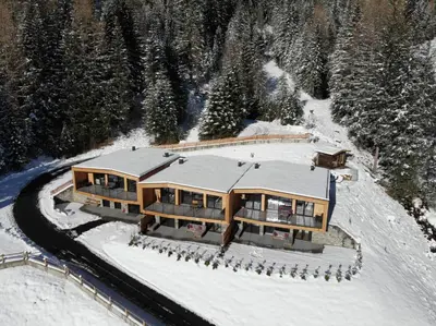 an aerial view of a house in the snow at Stelza Nature Chalet in Val di Vizze