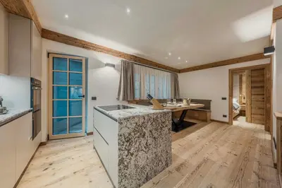 a bathroom with a sink and a toilet and a shower at Chalet Socrepes - Dolomiti Skyline in Cortina dʼAmpezzo