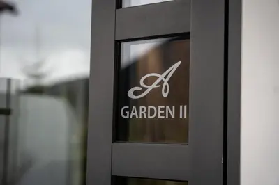 a door with a sign that says garden ii at Villa A - NEW OPENING in Selva di Val Gardena