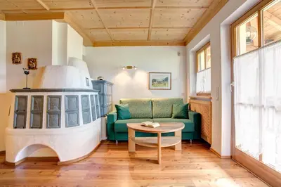 a living room with a couch and a table at Lavendelhof in Appiano sulla Strada del Vino