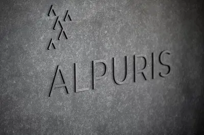 a book with the word alpurs written on it at Alpuris - Your Boutique Suite - Hotel B&B in Cavalese