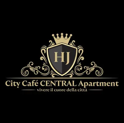 a shield with a crown on top of it at City Café - CENTRAL Apartment in Brunico