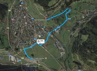 a map of a river with a blue trail at Hotel Sonnenheim in Vipiteno