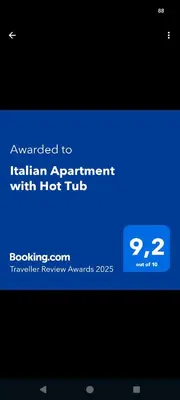 a screenshot of a cell phone with the textrated to italian apartments with hot at Italian Apartment with Hot Tub in Arabba