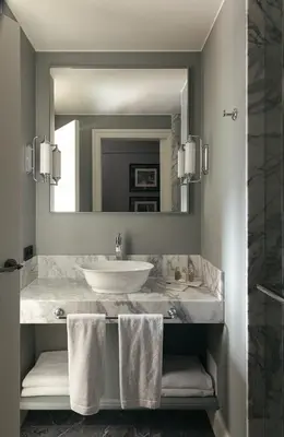 a bathroom with a sink and a mirror at Hotel Elephant in Bressanone