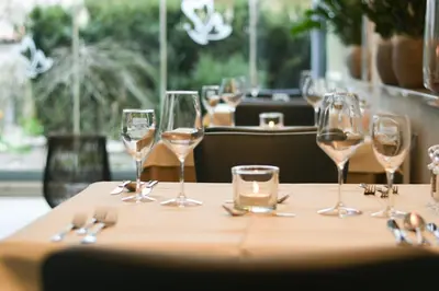 a group of wine glasses sitting on a table at Wohlfühlhotel Mei Auszeit in Plaus