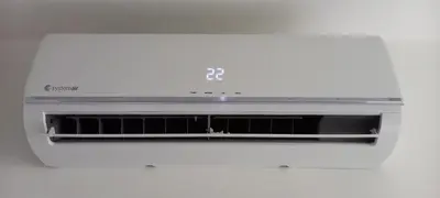 a white microwave oven sitting on top of a counter at Terrazza Central Apartments in Bolzano