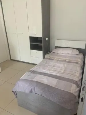 a small bedroom with a bed in a room at Obsthof Klotz in Frangarto
