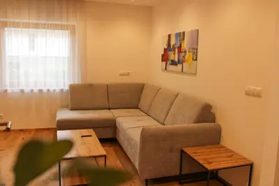 a living room with a couch and a table at Residence Klementhof in Naz-Sciaves