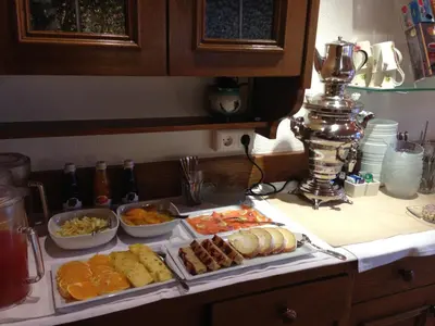 a table with different types of food on it at Hotel & Appartement Valtnaungut in Cermes