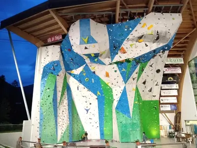 a large bouldering wall in a gym at Appartamento Campitello House in Campitello di Fassa