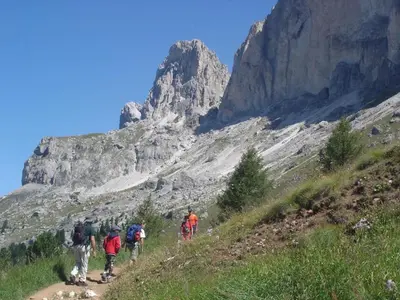 a group of people walking on a mountain trail at Residence Klementhof 2 in Fiumes