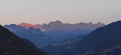 a view of a mountain range with mountains in the background at Villa for a get away in Soprabolzano
