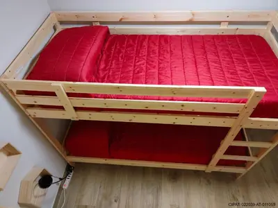 an overhead view of a bunk bed in a room at Pordoi H10 - with SAUNA in Alba di Canazei