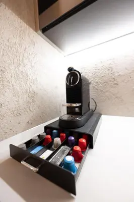 a black box filled with colorful balls on a table at Cesa Ardon 1 in Campitello di Fassa