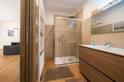 a bathroom with a shower and a sink at Cauriol Suites 1.1 in Cavalese