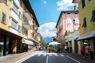 an empty street in a town with buildings at Cauriol Suites 1.1 in Cavalese