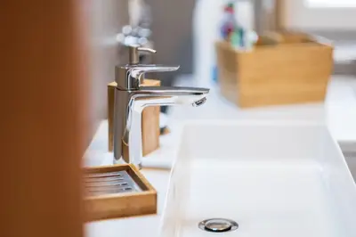 a bathroom sink with a chrome bathroom faucet at Casa Scardanzan in Canale dʼAgordo