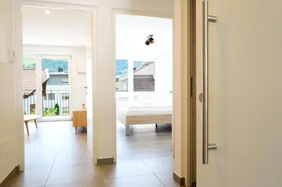 a room with a bed and a window at Apartment Oleander - Alpstay in Naturno