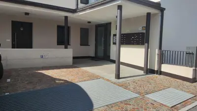 a view of a building with the doors open at Apartment Oleander - Alpstay in Naturno