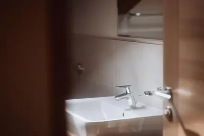 a bathroom with a sink and a mirror at Der Mittermoar in Bressanone