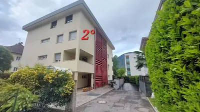 a white building with the number two on it at ROCCO's APARTMENT - in centro a Merano in Merano