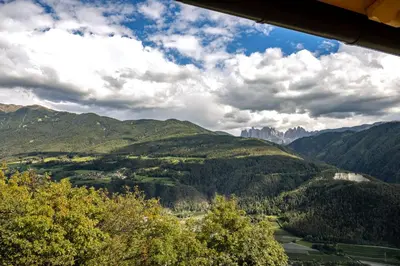 a view of a valley in the mountains at Stillehof - Ferienwohnungen auf dem Bauernhof- Südtirol in Bressanone