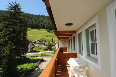 a balcony with a view of a mountain at Casa El Tobià in Pozza di Fassa