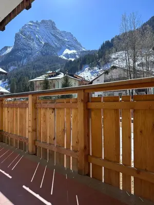 a room with a rack of snowboards and snowboards at Villa L'Aida in Canazei