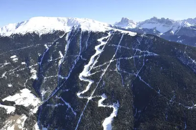 an aerial view of a mountain with snow at Hotel Grüner Baum in Bressanone