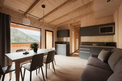 a dining room with a table and chairs at Villa Melitta in San Vigilio Di Marebbe