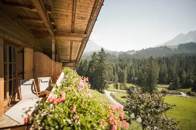 a balcony of a house with a view of a mountain at Karerhof in Nova Levante