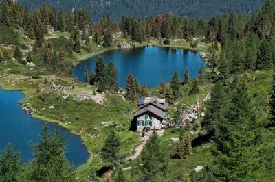 a small house on an island in a lake at Casa Lucia in Mezzano