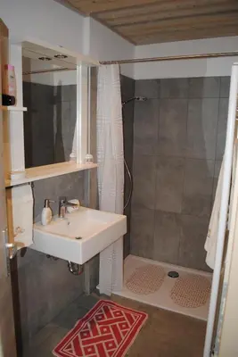 a bathroom with a sink and a shower at Casa Vacanza San Martino in Fondo